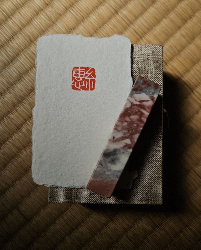 bespoke hand-carved stone seal by Moss Stone Studio