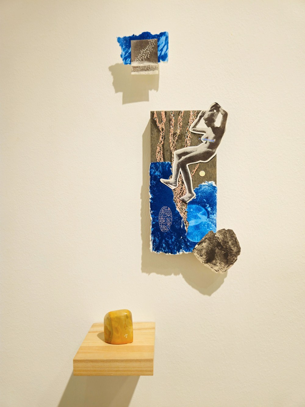 Cyanotype collage with carved seal impression